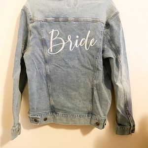 Well made embroidered in cursive BRIDE 👰‍♀️ Jean Jacket size small light blue
